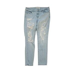 Levis 711 skinny high rise light wash distressed jeans womens size 31